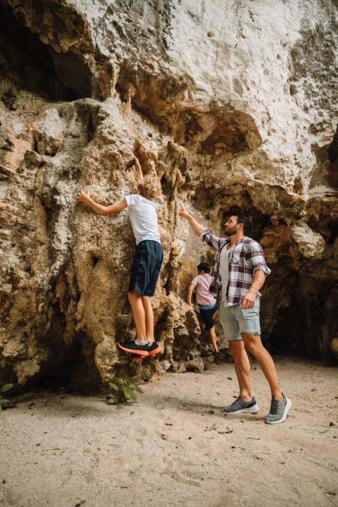 Climbing rocks in a natural cave.